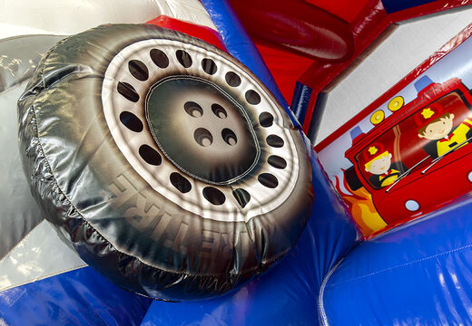 Inflatable slide combo bouncy castle in firefighter theme to buy at JB Inflatables UK. Buy inflatable bouncy castles with slide and red color for kids