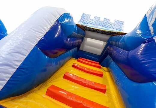 Large inflatable open blue multiplay bouncer with slide in princess pirate theme for kids. Buy bouncers online at JB Inflatables UK