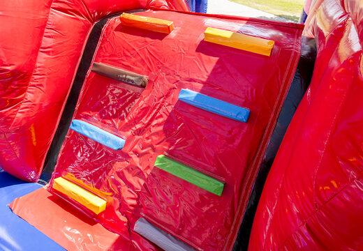 Multiplay indoor fire brigade bouncer with a slide for children. Order bouncers online at JB Inflatables UK