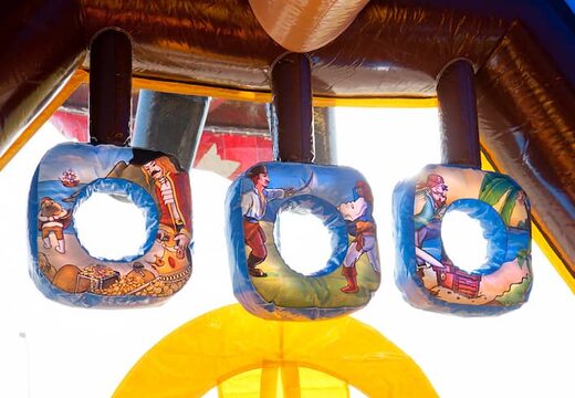 Buy shooting combo pirate bouncy castle covered, with cannon game and slide for kids. Order inflatable bouncy castles online at JB Inflatables UK