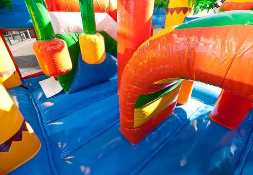 Bouncer in beach theme with a slide for children. Buy inflatable bouncers online at JB Inflatables UK