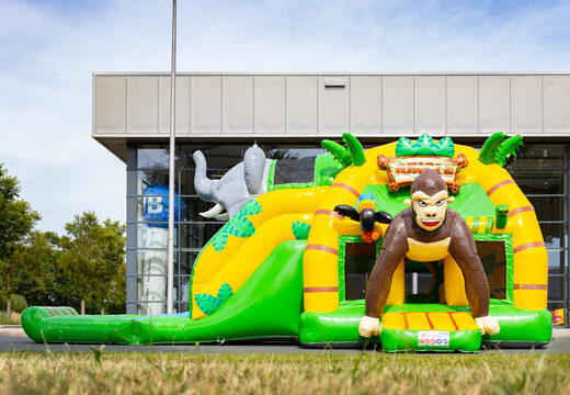 Order multi super inflatable bouncer with slide in Jungle theme green yellow for children