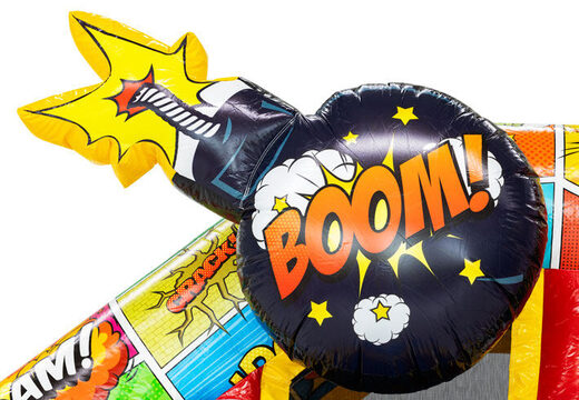 Bomb on top of slide combo bouncy castle in comic theme