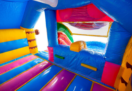 Inside of the Double Slide Combo Bouncy Castle in blue, yellow, and purple at JB