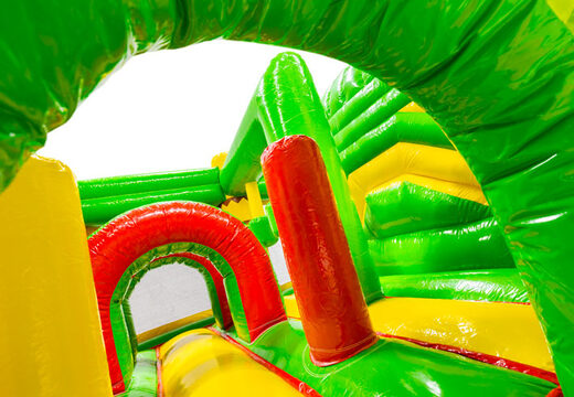 Interior of bouncy castle with arches, pillars, and punching bags for sale at JB